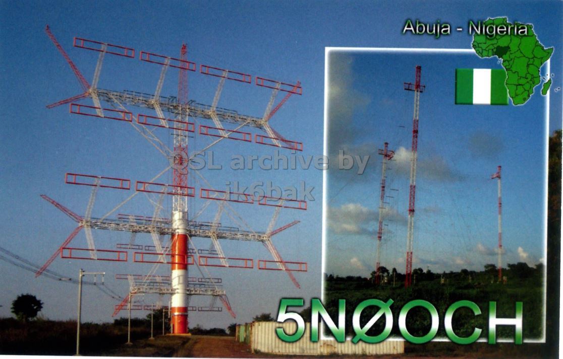 Front QSL card, of 5N7Q to IK2GRA, October 4, 2011, CW mode. The QSL image contains the following objects: Utility Pole. And contains this text: Abuja - Nigeria OSL archive by 5NOOCH Abuja - Nigeria archive by 5NOOCH.