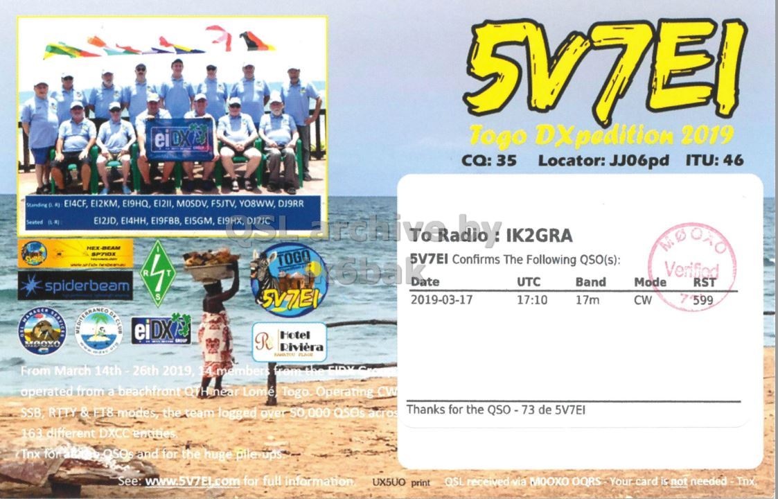 Right QSL card, of 5V7EI to IK2GRA, March 17, 2019, CW mode. The QSL image contains the following objects: Person, Document. And contains this text: 5V7EI Togo DXpedition 2019 CQ: 35 Locator: JJ06pd ITU: 46 Standing di KJ EI4CF, F5JTV, NEX-BEAM SP7IDX EI2KM, EI2JD, EI4HH, EI9HQ, EI9FBB, EI211, MOSDV, EI5GM, YO8WW, DJ9RR IK2GRA 5V7EI Confirms The Following QSO(s): TOGO R Verified UTC Band Mode RST spiderbeam S 2019-03-17 17:10 17m CW eiDX Hotel R Rivièra From March 14th - 26th 2019, 14-members from operated from a beachfront QTH near Lomé, Togo Operating CW Thanks for the QSO - 73 de 5V7EI SSB, RITY.