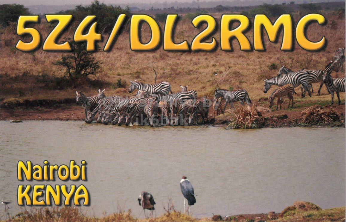 Front QSL card, of 5Z4/DL2RMC to IK2GRA, February 26, 2017, CW mode. The QSL image contains the following objects: Animal, Zebra, Herd, Bird, Zoo. And contains this text: 5Z4/DL2RMC Nairobi KENYA.