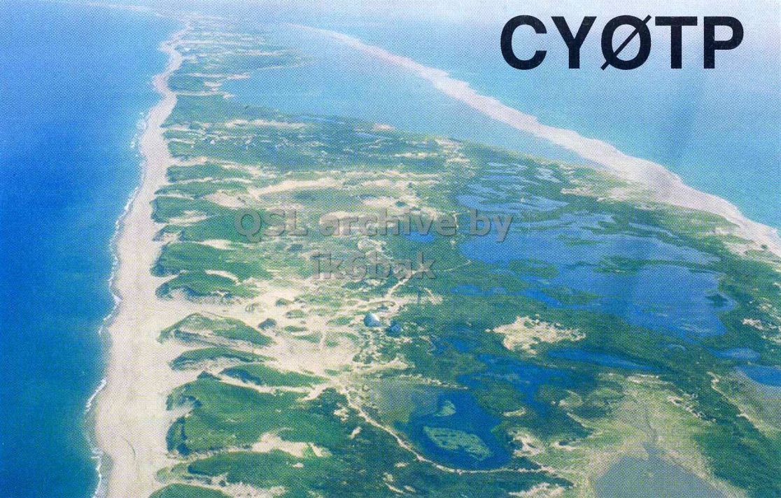 Front QSL card, of CY0TP to IK2GRA, October 5, 1995, CW mode. The QSL image contains the following objects: Land, Nature, Outdoors, Sea, Water. And contains this text: by.