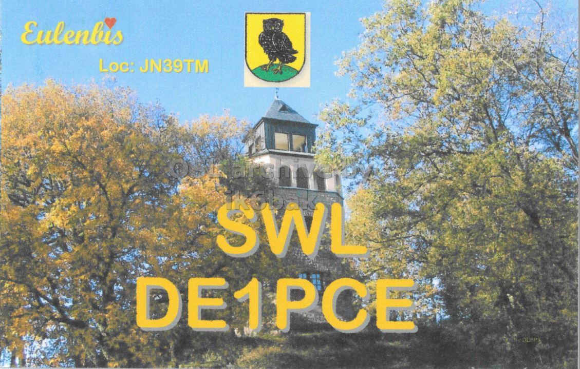 Front QSL card, of DE1PCE to IK2GRA, November 1, 2019, CW mode. The QSL image contains the following objects: Bell Tower, Vegetation, Monastery, Tree, Woodland. And contains this text: Eulenbis Loc: JN39TM SWL DE1PCE.