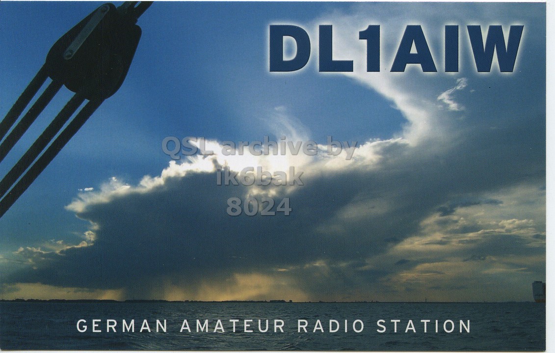 Front QSL card, of DL1AIW to IK6BAK, March 23, 2013, CW mode. The QSL image contains the following objects: Nature, Outdoors, Sky, Fork, Sailboat. And contains this text: DL1AIW ik6bak 8024 GERMAN AMATEUR RADIO STATION.