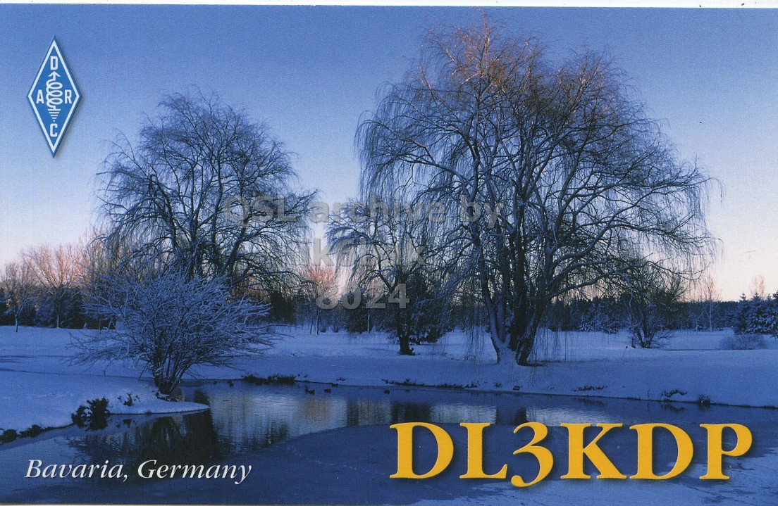 Front QSL card, of DL3KDP to IK6BAK, May 22, 2023, CW mode. The QSL image contains the following objects: Tree, Nature, Outdoors, Scenery, Landscape. And contains this text: A R 8024 Bavaria, Germany DL3KDP.