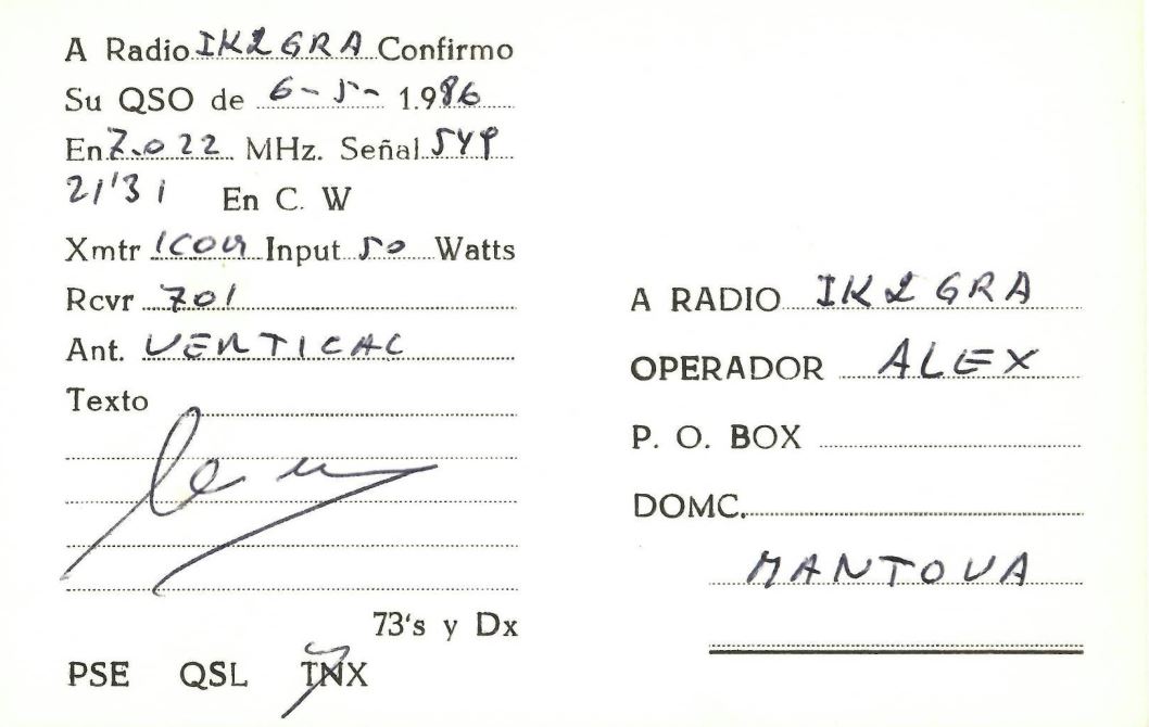 Right QSL card, of EA2AAI to IK2GRA, May 6, 1986, CW mode. The QSL image contains the following objects: Handwriting. And contains this text: A Radio IK2 GRA Confirmo Su QSO de 6-5- 1.986 En C. W Rcvr 701 A RADIO IK2GRA Ant. VERTICAL ALEX OPERADOR Texto P. О. BOX DOMC. 73's y Dx PSE QSL A Radio IK2 GRA Confirmo Su QSO de 6-5- En7.022 MHz. En C. W Xmtr Input 50 Watts Rcvr 701 A RADIO IK2GRA Ant. VERTICAL ALEX OPERADOR Texto P. BOX DOMC. 73's y Dx PSE QSL.