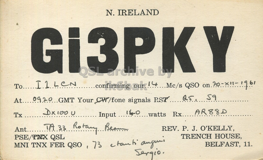 Front QSL card, of GI3PKY to I1LCN, December 20, 1961, PH mode. The QSL image contains the following objects: Advertisement. And contains this text: N. IRELAND QSL by At...0920.GMT Your CW/fone signals RST.... Q5 59 Tx REV. P. J. O'KELLY, TRENCH HOUSE, PSE/TNX QSL BELFAST, 11. MNI TNX FER QSO - 73 etanti angui N. IRELAND archive Y QSL by QSO Your CW/fone signals RST.... Q5 59 Tx Input 140 AR88D Ant...... Ro REV. J. O'KELLY, TRENCH HOUSE, PSE/TNX QSL BELFAST, 11. MNI TNX FER QSO - 73.