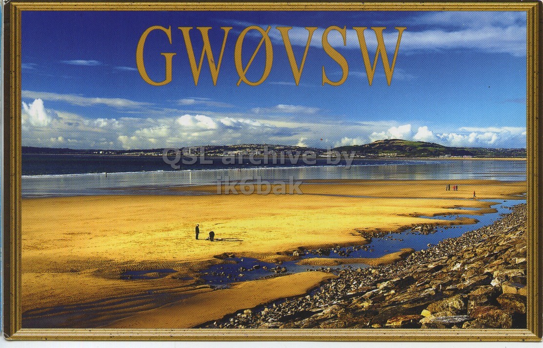 Front QSL card, of GW0VSW to IQ6FU, November 10, 2014, CW mode. The QSL image contains the following objects: Beach, Outdoors, Sea, Scenery, Land. And contains this text: GWOVSW QSL archive DY ik6bak GWOVSW QSL archive DY ik6bak.