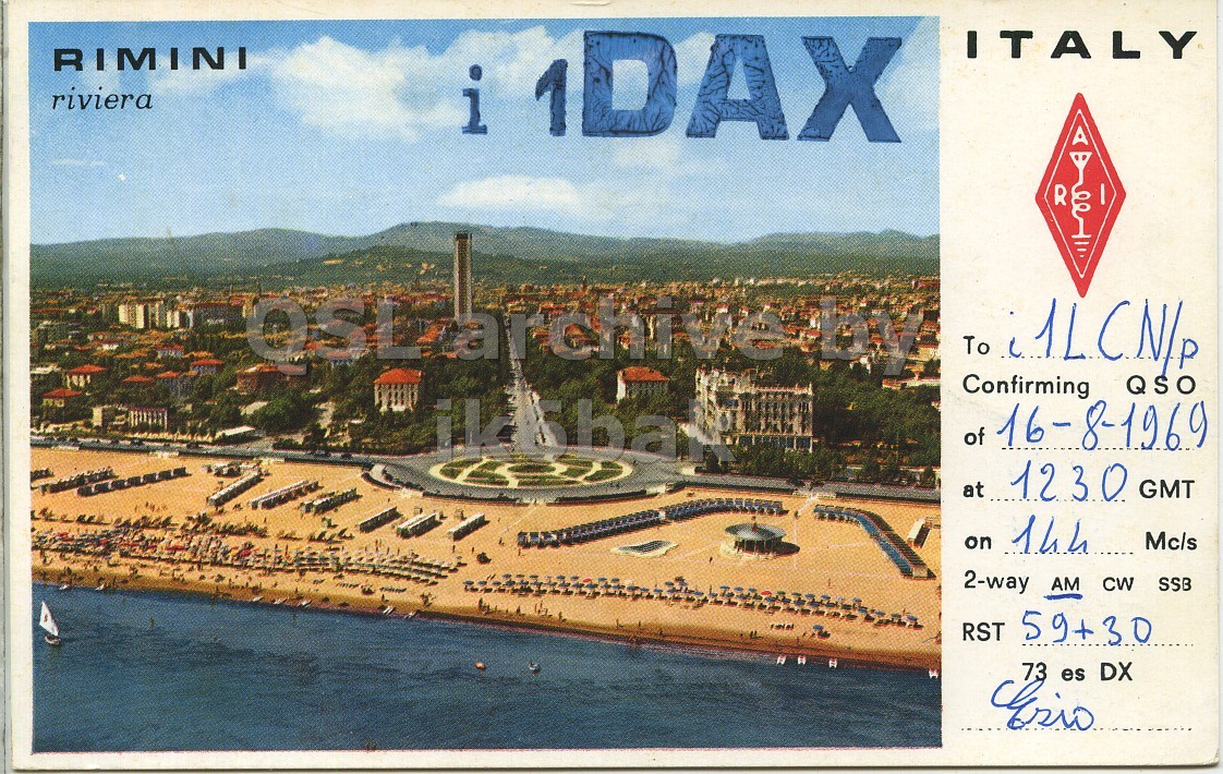 Front QSL card, of I1DAX to I1LCN/P, August 16, 1969, AM mode. The QSL image contains the following objects: Envelope, Mail, Boat, City. And contains this text: i DAX ITALY RIMINI riviera R Confirming QSO of 16-8-1969 at 1230 GMT on 14h Mc/s 2-way AM CW SSB RST 59+30 73 es DX i DAX ITALY RIMINI riviera R To Confirming QSO of 16-8-1969 at 1230 GMT on Mc/s 2-way AM CW SSB RST 59+30 73 es DX.