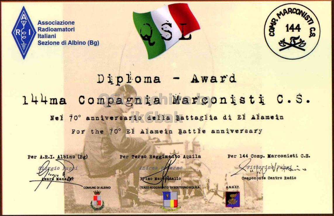 Front QSL card, of II2TRA to IK2GRA, September 18, 2012, CW mode. The QSL image contains the following objects: Person, Face, Head. And contains this text: A Associazione Radioamatori R I COMP. MARCONISTI 144 CA Italiani Sezione di Albino (Bg) Diploma - Award Nel 70° di El Alamein For the 70° E Alamein Battle anniversary Per A.R.I. Albino (Bg) Per Terzo Reggimento Aquila Per 144 Comp. Marconisti c.s. Rrimo Componente Centro Radio TERZO REGGIMENTO DI SOSTEGNO AQUILA A.N.G.E.T. COMUNE DI ALBINO A Associazione Radioamatori R I COMP. MARCONISTI 144 Italiani Sezione di Albino (Bg) Diploma - Award 144ma Nel 70° di Alamein For the 70° Alamein Battle anniversary Per A.R.I. Albino (Bg) Per Terzo Reggimento Aquila Per 144 Comp. Marconisti c.s. Rrimo Centro Radio TERZO REGGIMENTO DI SOSTEGNO AQUILA A.N.G.E.T. COMUNE DI ALBINO.