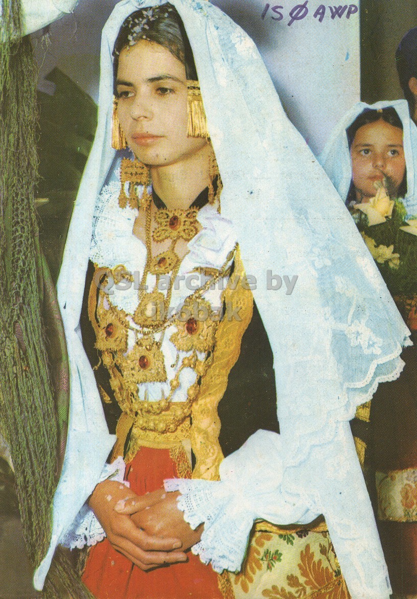 Front QSL card, of IS0AWP to I2LCN, December 19, 1971, SSB mode. The QSL image contains the following objects: Adult, Bride, Female, Person, Woman. And contains this text: by AWP by.