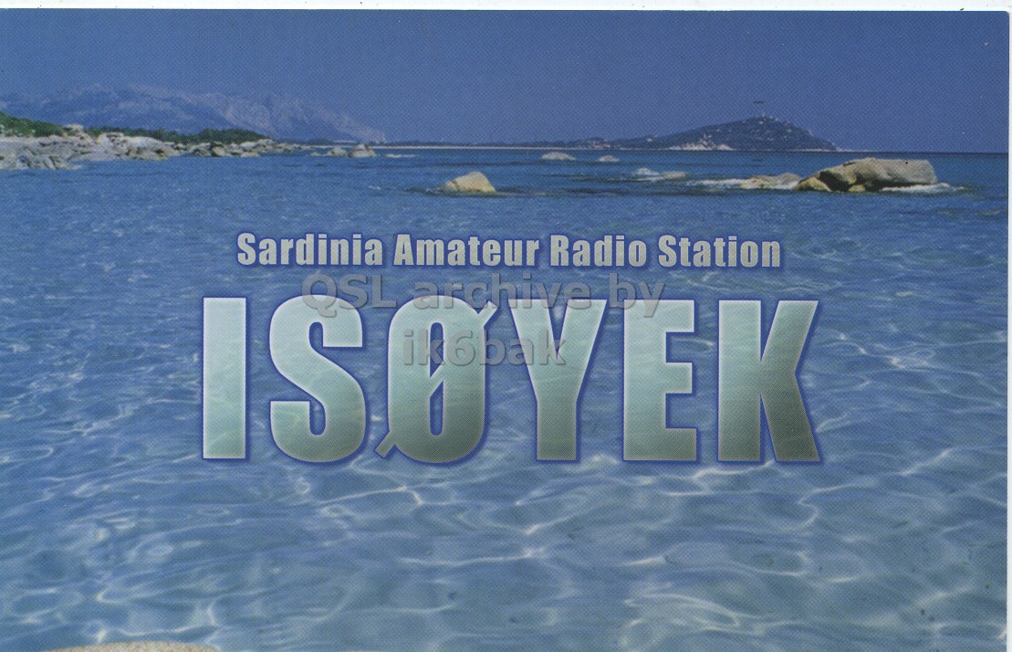 Front QSL card, of IS0YEK to IK6CQC, June 17, 2008, RTTY mode. The QSL image contains the following objects: Land, Nature, Outdoors, Sea, Water. And contains this text: Sardinia Amateur Radio Station by Sardinia Amateur Radio Station OSL archive by.
