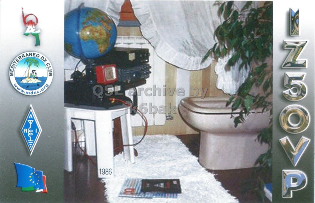 Front QSL card, of IZ5OVP to IK2GRA, December 11, 2011, CW mode. The QSL image contains the following objects: Indoors, Home Decor, Plant, Outer Space. And contains this text: MEDITERRANEO DX CLUB www.mdxc.org QSL archive by ik6bak A R 1986 MEDITERRANEO DX CLUB www.mdxc.org QSL archive by ik6bak A R 1986.