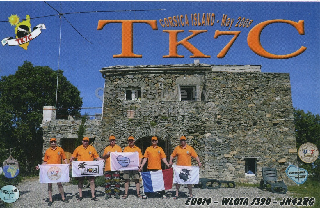 Front QSL card, of TK7C to IK6CQC, May 7, 2008, SSB mode. The QSL image contains the following objects: T-Shirt, People, Person, Shelter, Man. And contains this text: CORSICA ISLAND May 2008 TK7C T K7 C UFT CLIPPERTON S IOTA T U - CLIPPERTON DX CLUB F6KOP TEAM CORSICA ISLAND May 2008 TK7C T K7 C UFT CLIPPERTON CLUB S T U - CLIPPERTON CLUB F6KOP TEAM.