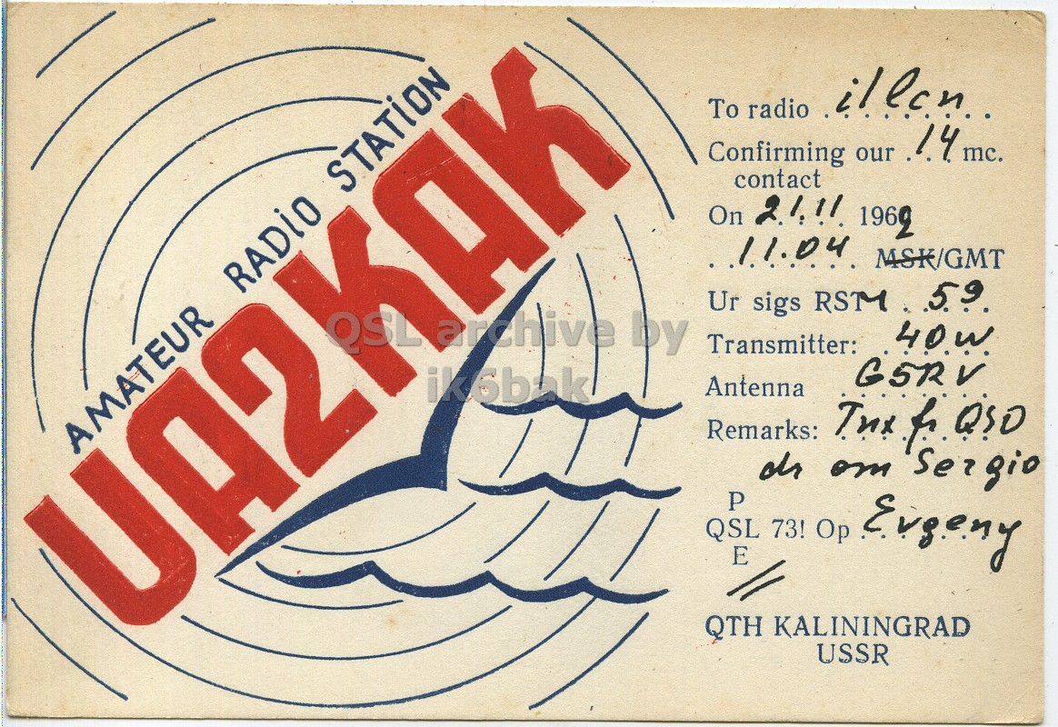 Front QSL card, of UA2KAK to I1LCN, November 21, 1962, PH mode. The QSL image contains the following objects: Envelope, Mail, Postcard. And contains this text: Confirming our 14 mc. contact RADiO STATION Ur sigs RSM 59 archive by Transmitter: G5RV ik6bak Antenna Remarks: AMATEUR QSL P E 73! Op Evgeny QTH KALININGRAD USSR To radio Confirming our mc. contact On MSK/GMT RADiO STATION QSL Ur sigs RSM archive by Transmitter: G5RV ik6bak Antenna Remarks: AMATEUR om Sergio QSL P E 73! Op QTH KALININGRAD USSR.