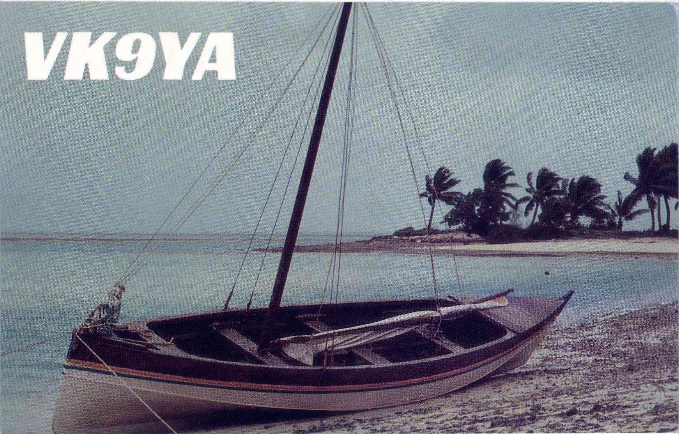 Front QSL card, of VK9YA to IK2GRA, May 1, 1990, CW mode. The QSL image contains the following objects: Boat, Sailboat, Yacht, Watercraft, Dinghy. And contains this text: VK9YA VK9YA.
